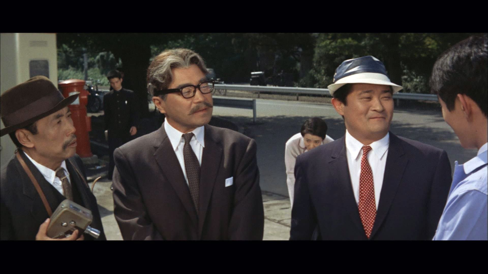 A Comedy in Front of the Station: University