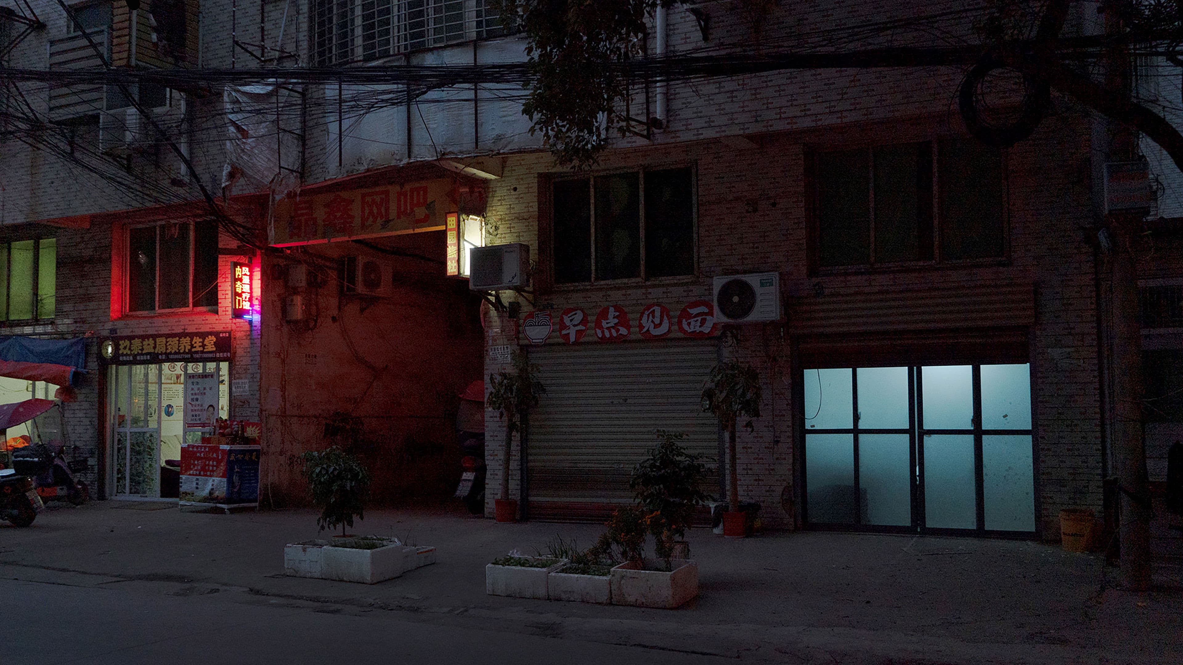 A Distant House Smokes on the Horizon