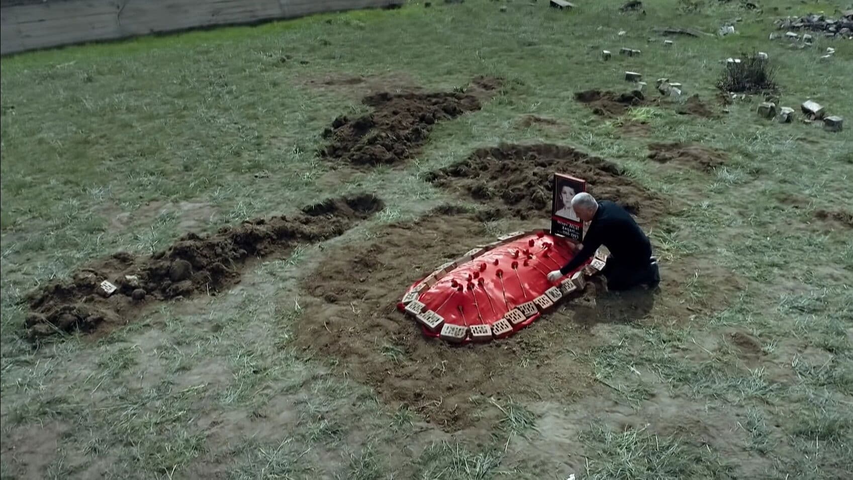 The grave under the plum tree