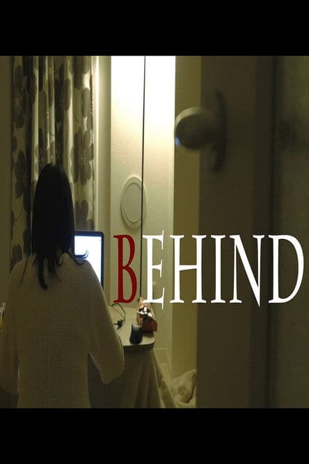 Behind poster
